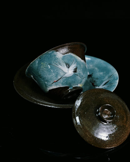 Black glaze gaiwan combining rough clay texture and painted design