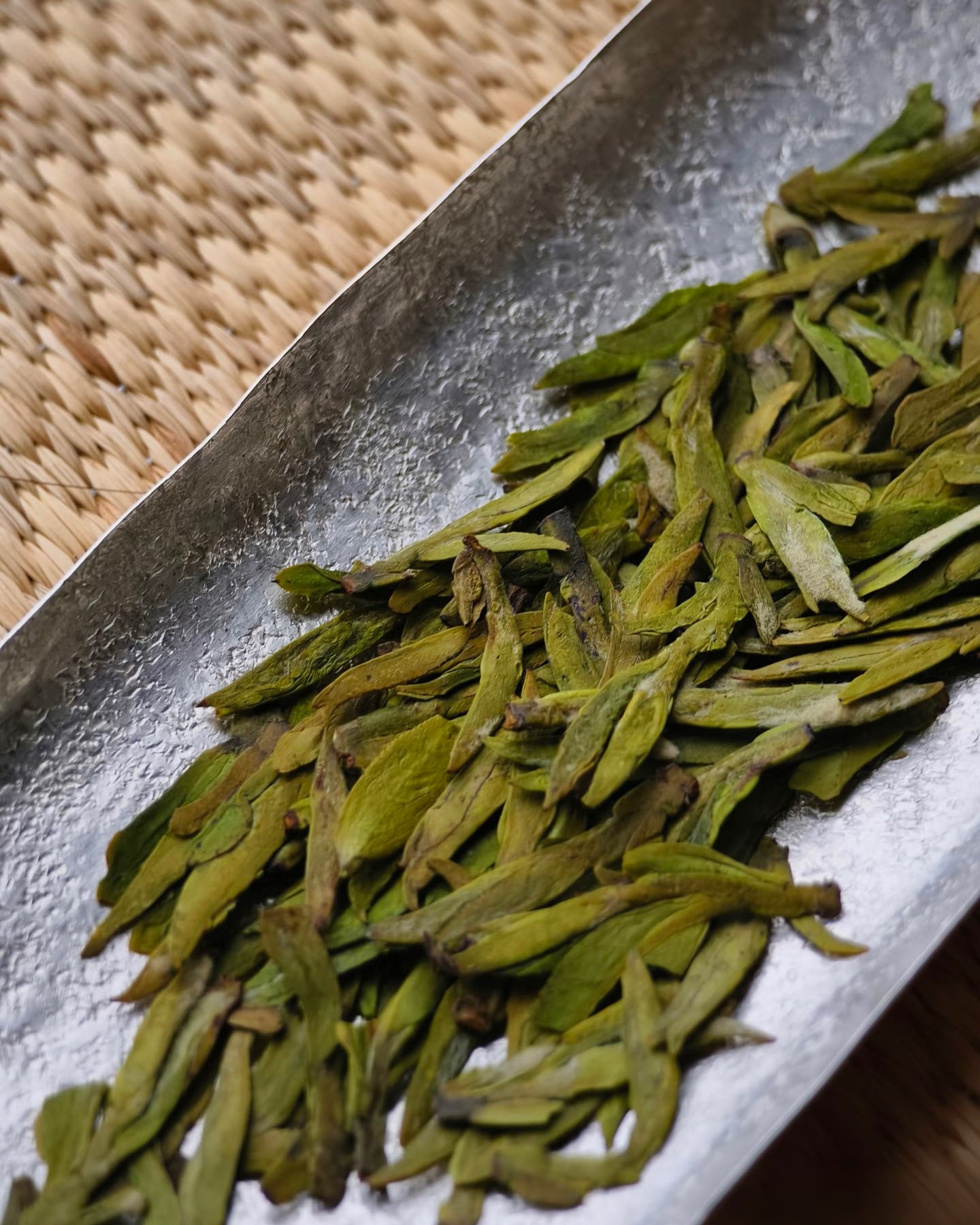Proper storage of Longjing tea in sealed container inside refrigerator for freshness