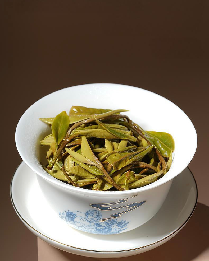 Fully expanded wet leaves of Supreme White Peony after brewing
