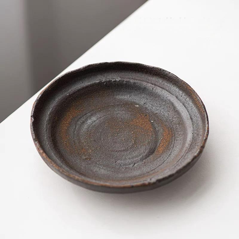 Wood ash glaze effect showing subtle crystalline formations from natural kiln atmosphere