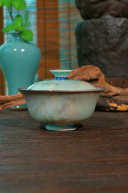 Stoneware 120ml gaiwan with natural flying ash glaze melt and cyan-violet flame-flushed lid