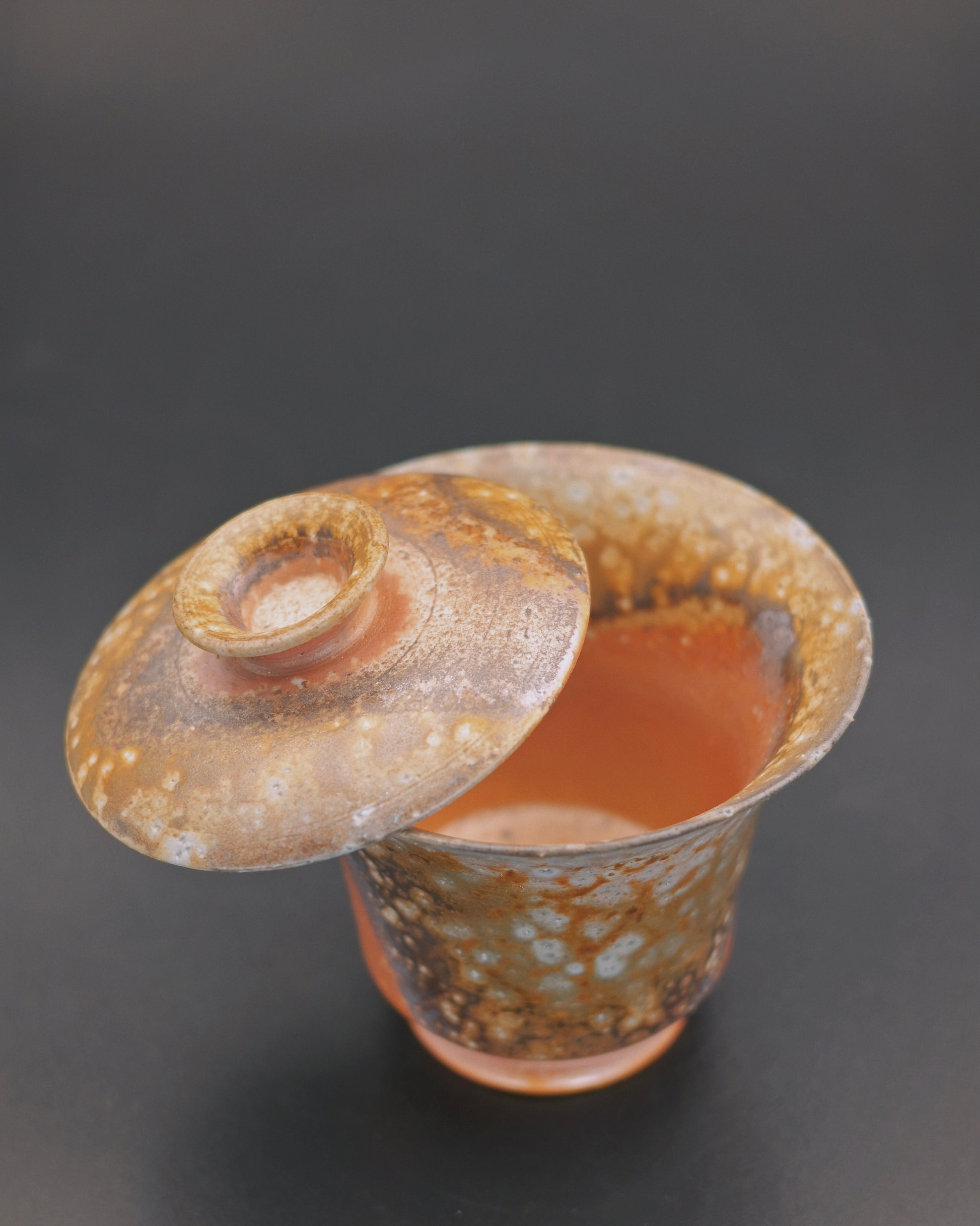 Interior view of unglazed clay gaiwan for aged white tea brewing