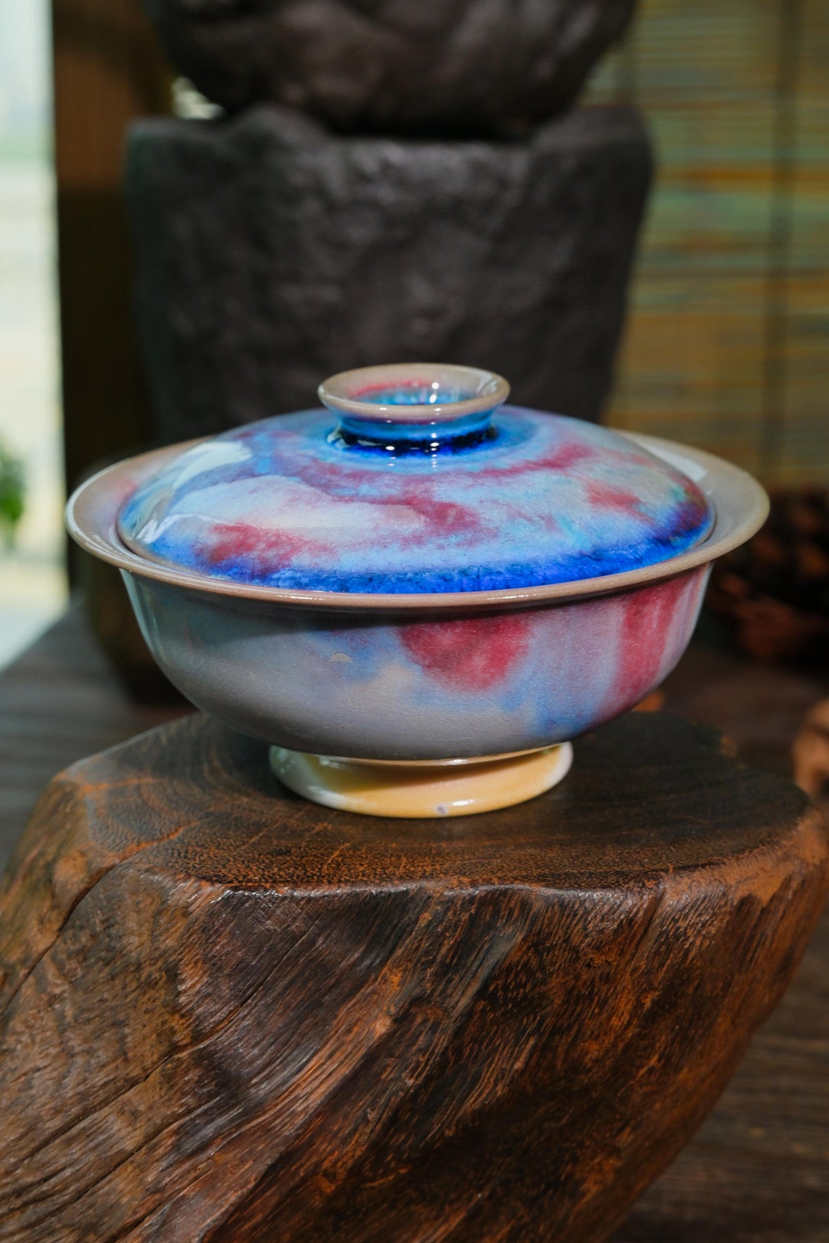 Close-up of 100ml wood-fired gaiwan wide Yuanbao lip and hollow lid knob for ergonomic tea pouring