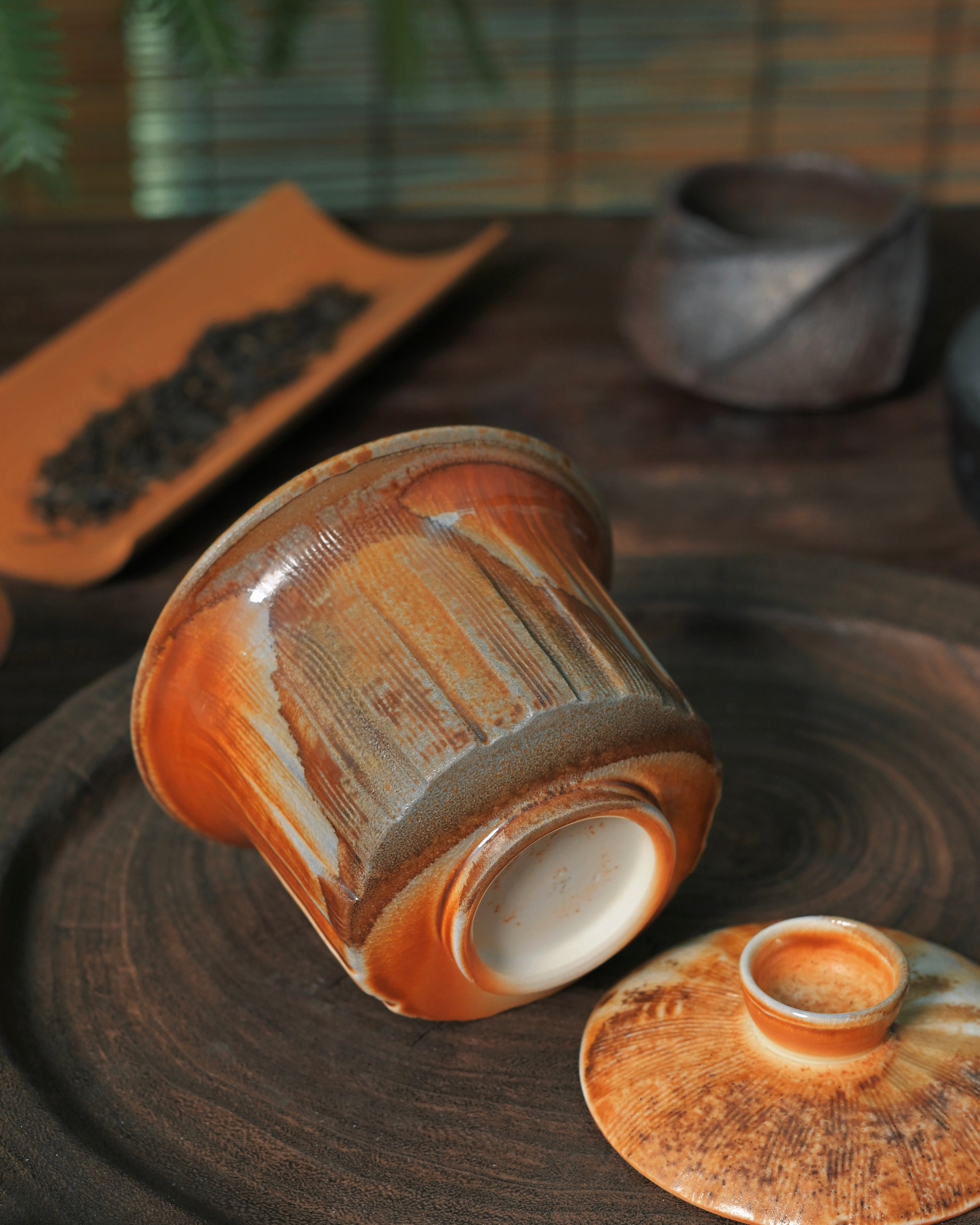 Wood-fired mid-white clay ceramic featuring natural mineral surface qualities