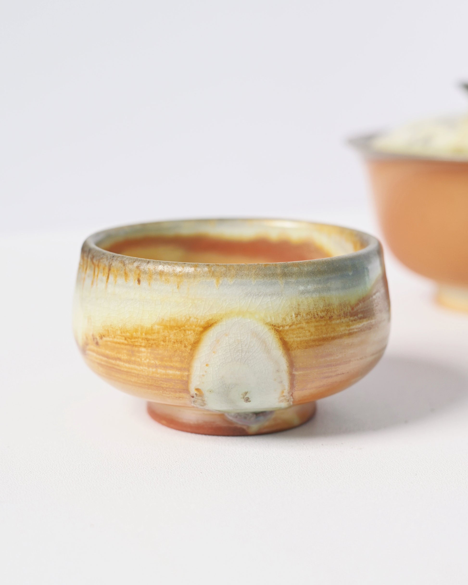 Natural crystalline glaze development from wood ash deposition during high-temperature kiln process