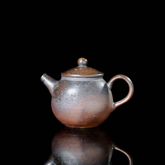 Traditional pine wood kiln fired teapot with natural ash glaze and unique kiln-transformed surface