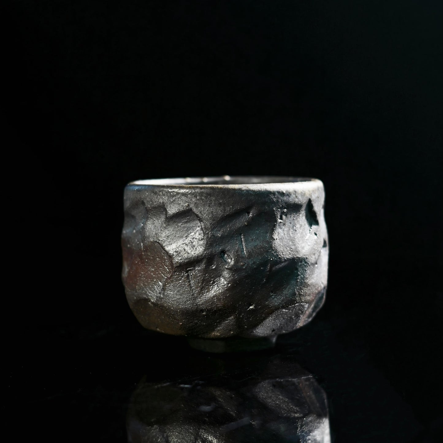 Wood-fired master teacup with unglazed granular surface fired at 1300°C in pinewood kiln