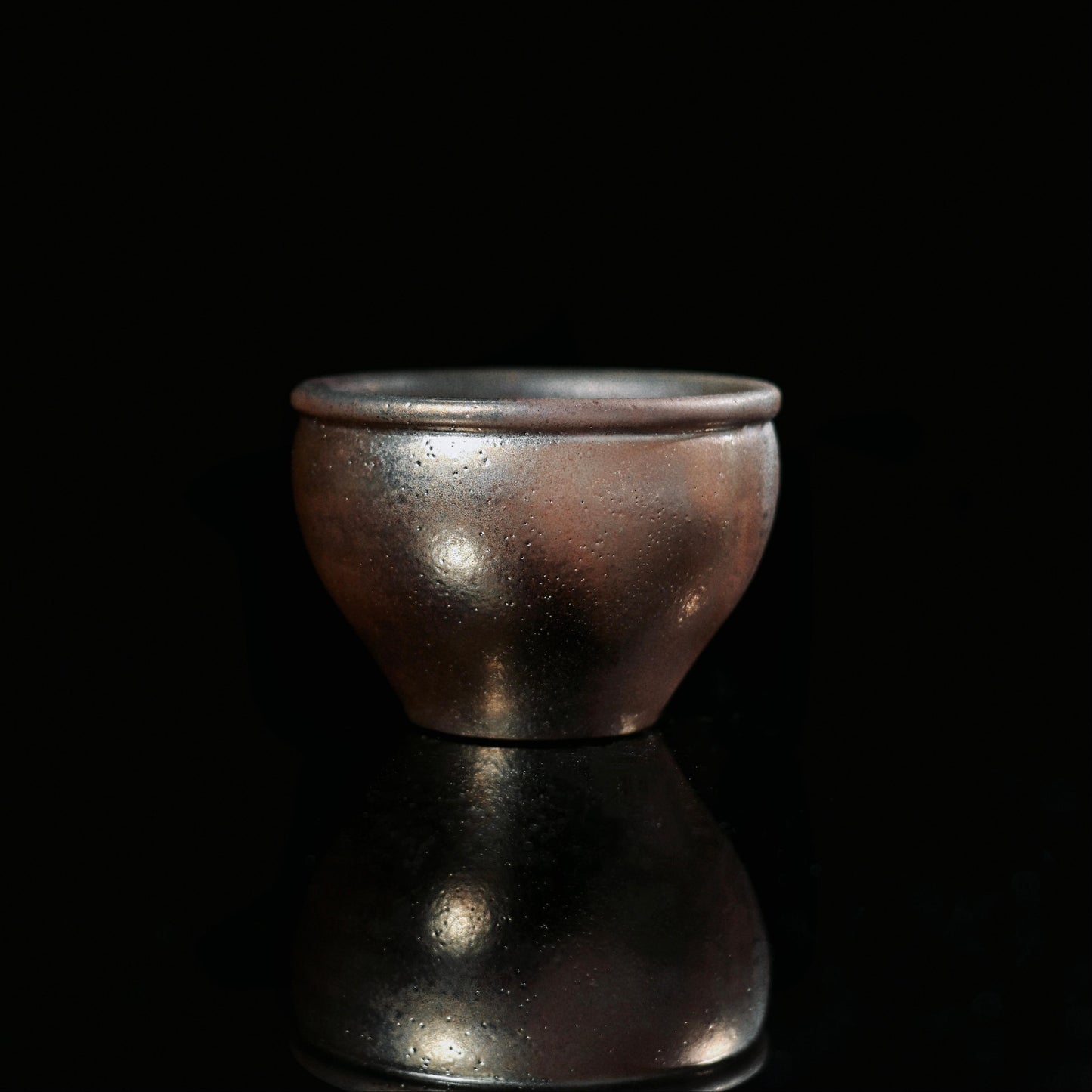 Chinese Jianshui wood-fired purple clay teacup in "Vat" shape ideal for oolong and pu-erh tea