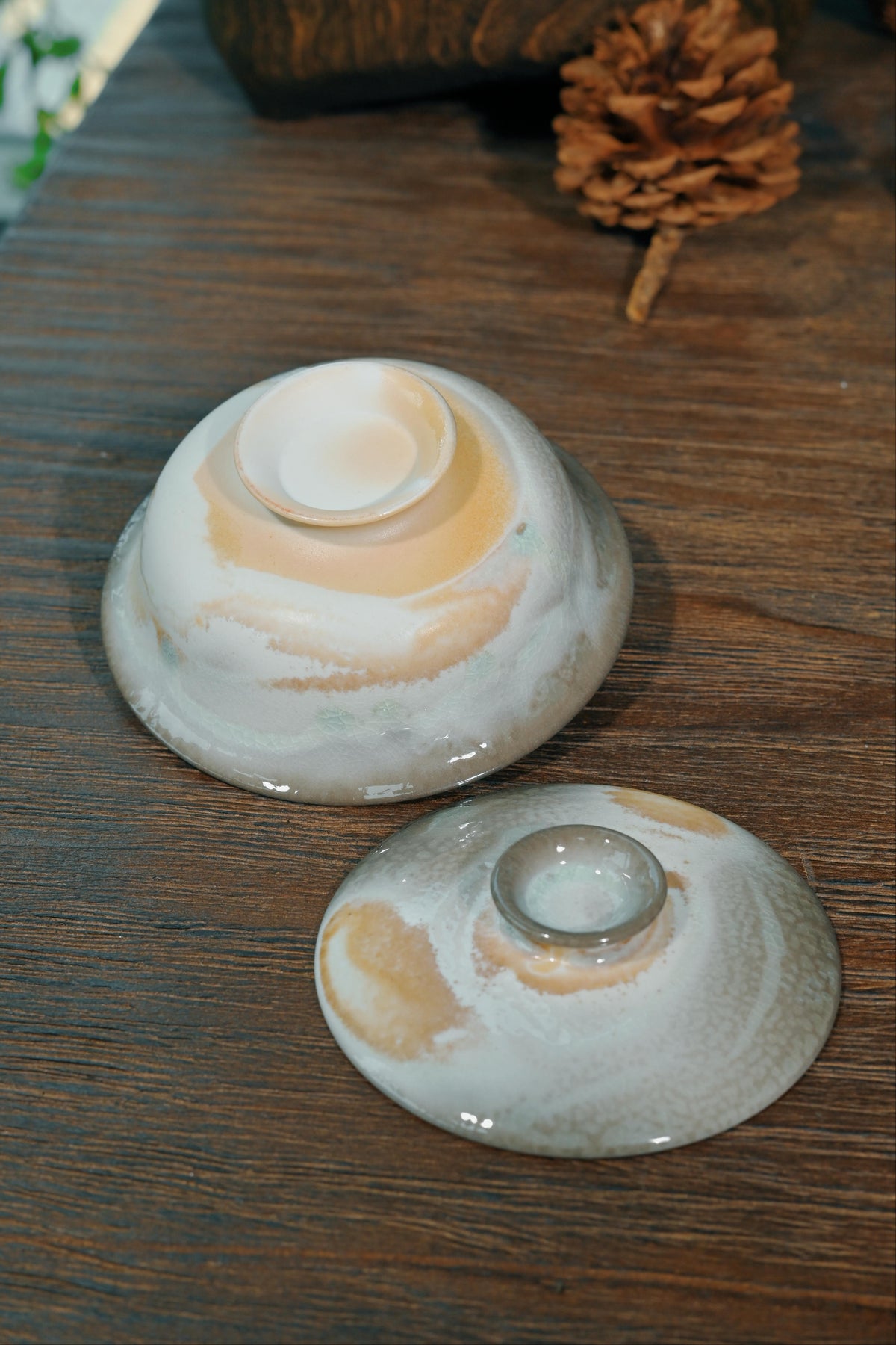 Unique 1-of-1 wood-fired tea vessel with gold ingot silhouette and organic flame marks