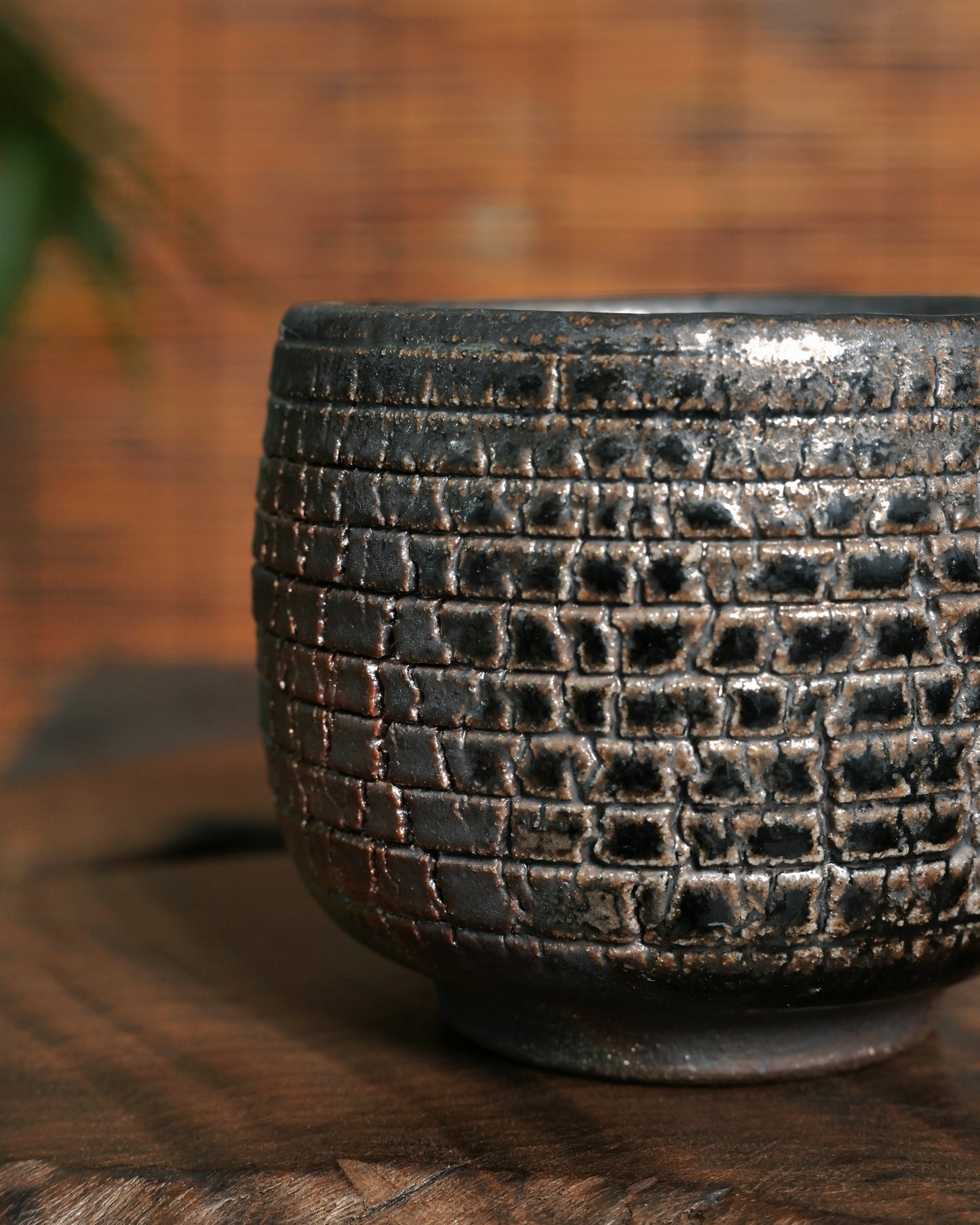 Iron-clay teacup developing richer coloration and patina with use