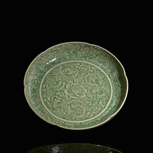 Yaozhou ware olive-green glazed plate with sharp carved nine phoenixes and peony floral motif