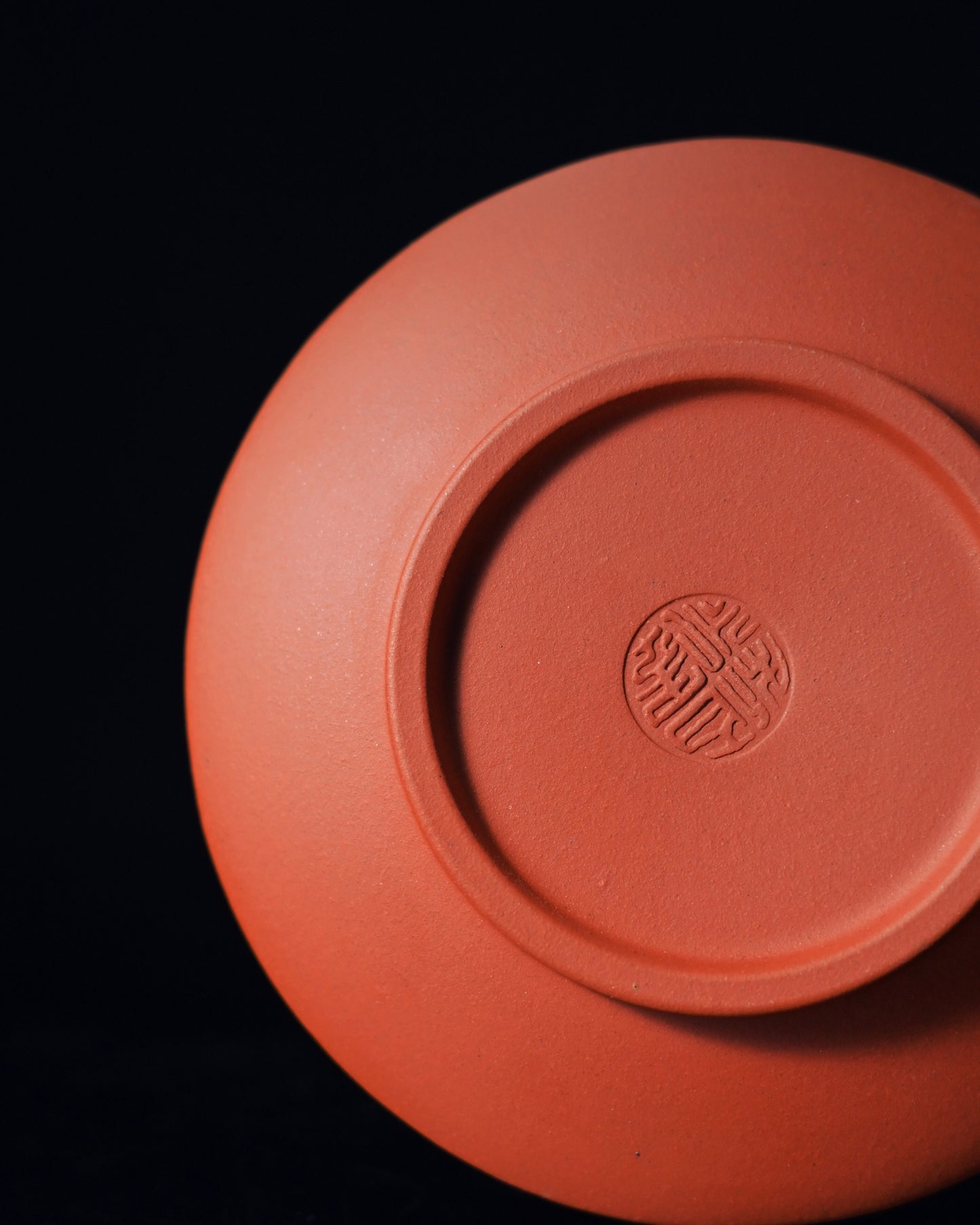 Unglazed Yixing teaware with natural clay texture suitable for dedicated tea practice