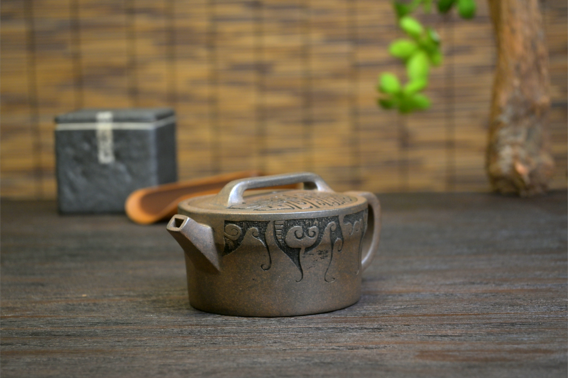 Rustic Yixing Duan clay teapot with subdued colors and graceful lines, representing traditional wood-fired craftsmanship