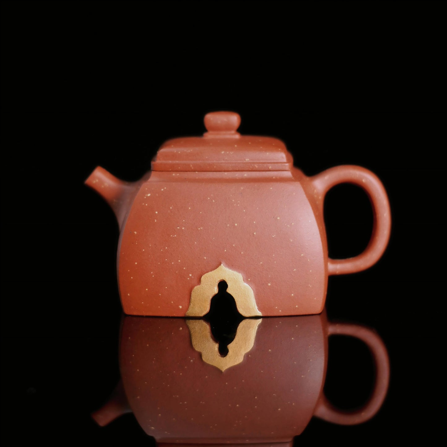 120ml Yixing teapot made from Hong Pi Long clay with carved Buddha design
