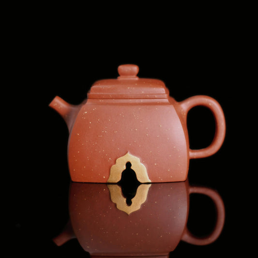 120ml Yixing teapot made from Hong Pi Long clay with carved Buddha design