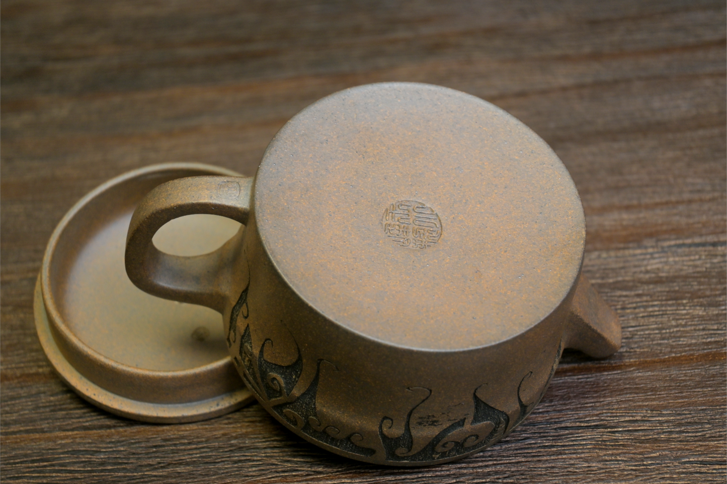 Authentic Yixing teapot made from original ore Duan clay, featuring natural wood-fired texture and Han-inspired design