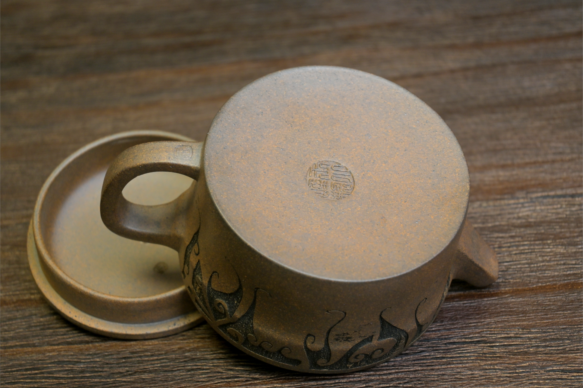 Authentic Yixing teapot made from original ore Duan clay, featuring natural wood-fired texture and Han-inspired design
