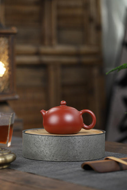 Celebrated Xishi form (Top 10 classic shapes) in rare dahongpao clay - where hydraulic engineering meets art through effortless pouring and lyrical contours.