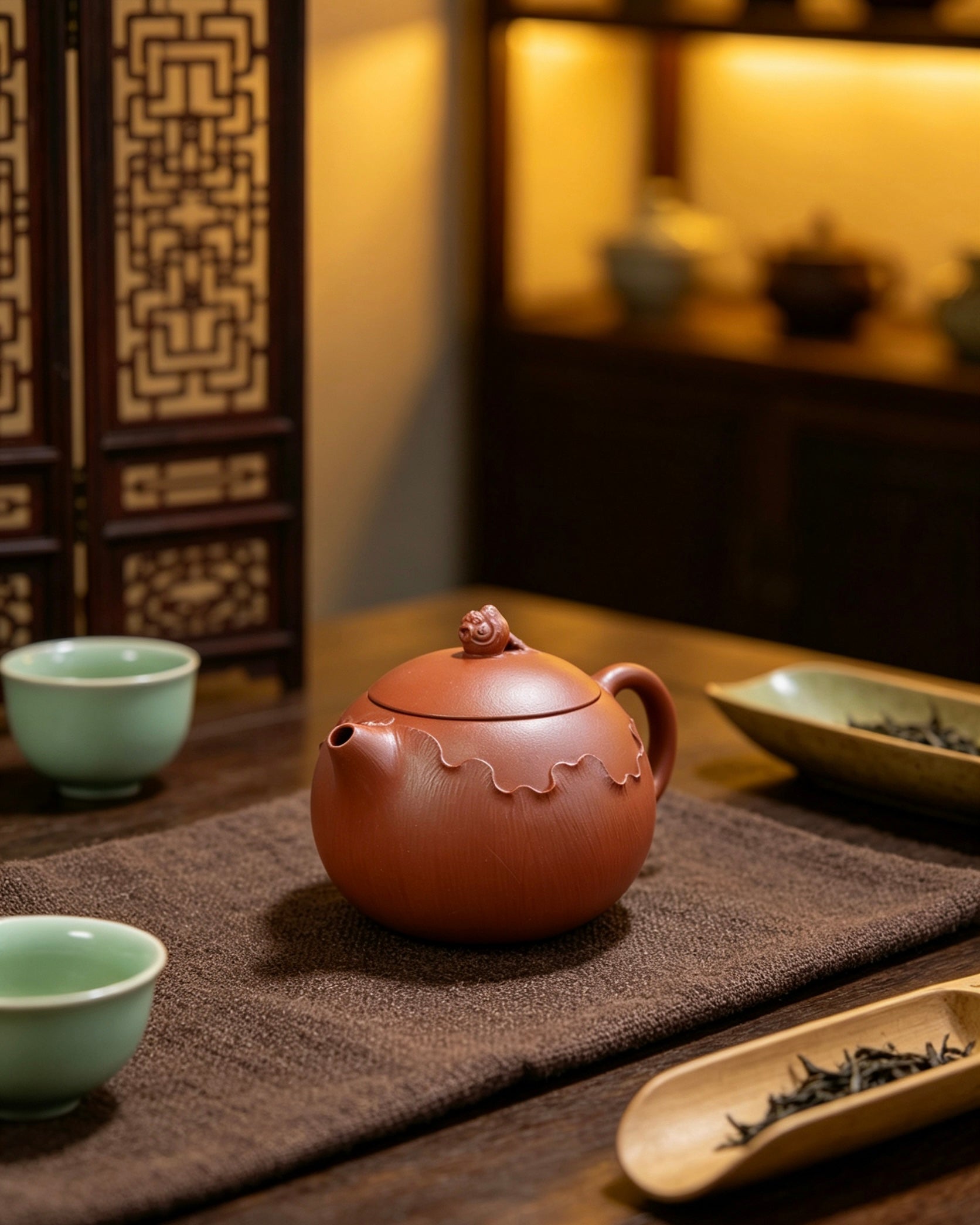 Goldfish knob symbolizing abundance and prosperity through jinyu homophone with gold and jade