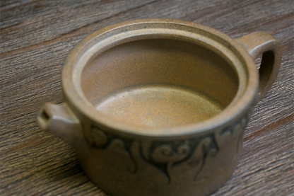 Completely engraved Yixing teapot with artist seals on all surfaces, including lid, bottom and interior areas