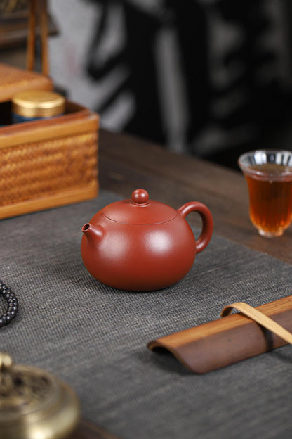 Where tradition meets taste: fully handmade Xishi teapot in legendary dahongpao clay, perfected through centuries of pu'erh and oolong brewing.