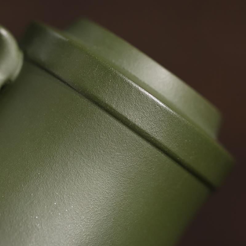 Close-up of unglazed clay surface revealing porous structure ideal for tea brewing