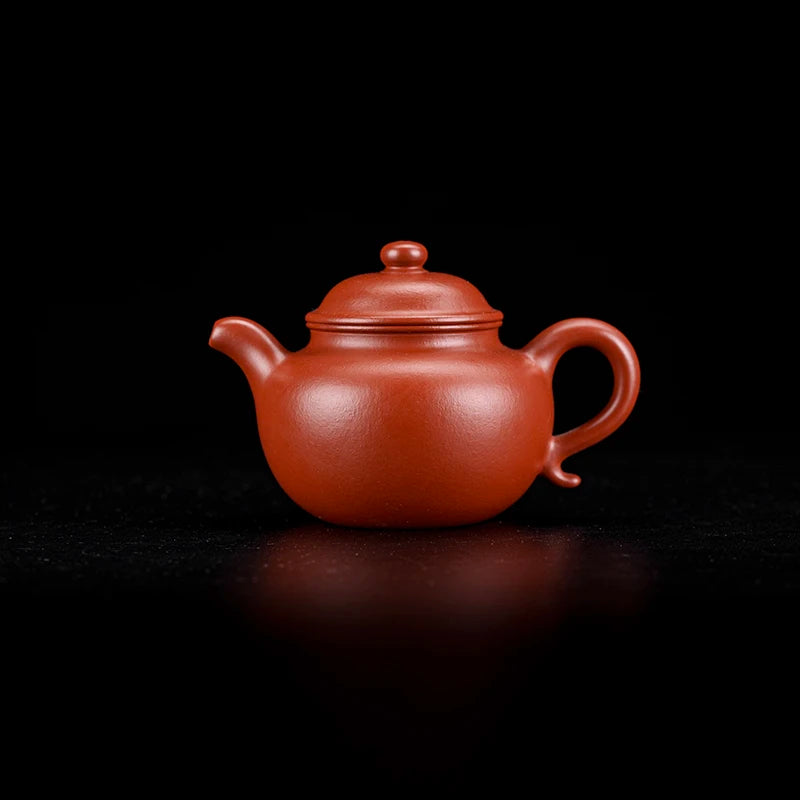 Yixing Zhuni lotus seed teapot with rounded plump belly and smooth spherical lid knob