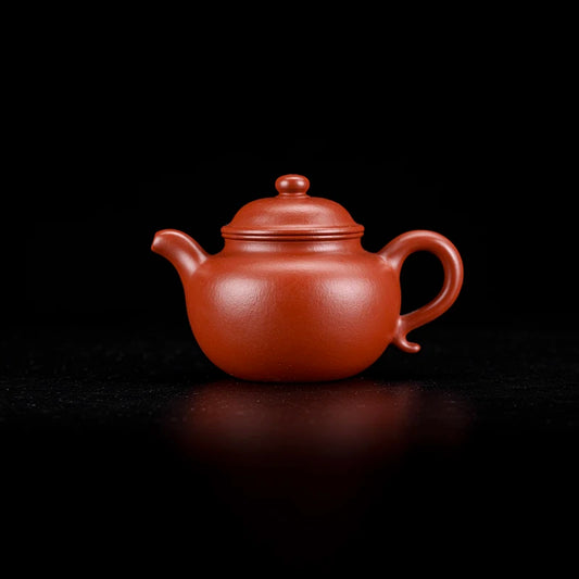 Yixing Zhuni lotus seed teapot with rounded plump belly and smooth spherical lid knob