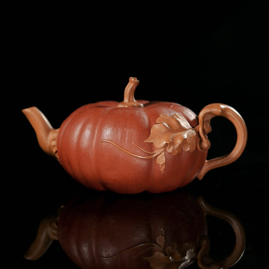 Yixing Zisha clay pumpkin teapot showing natural gourd-inspired form and handmade shaping