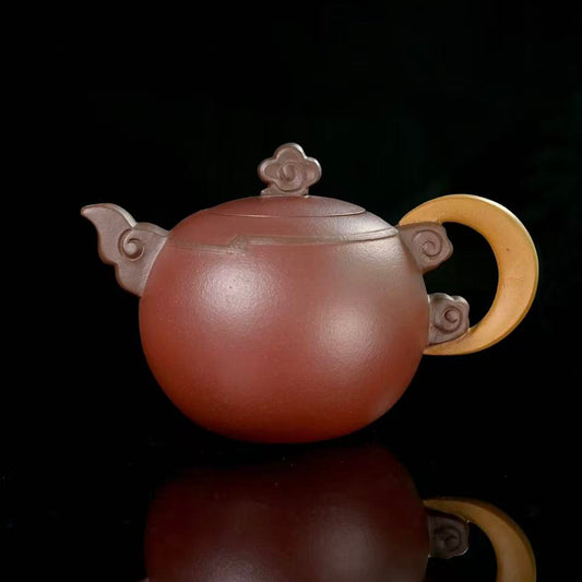 Handmade Yixing Zisha teapot with “Colorful Clouds Chasing the Moon” design