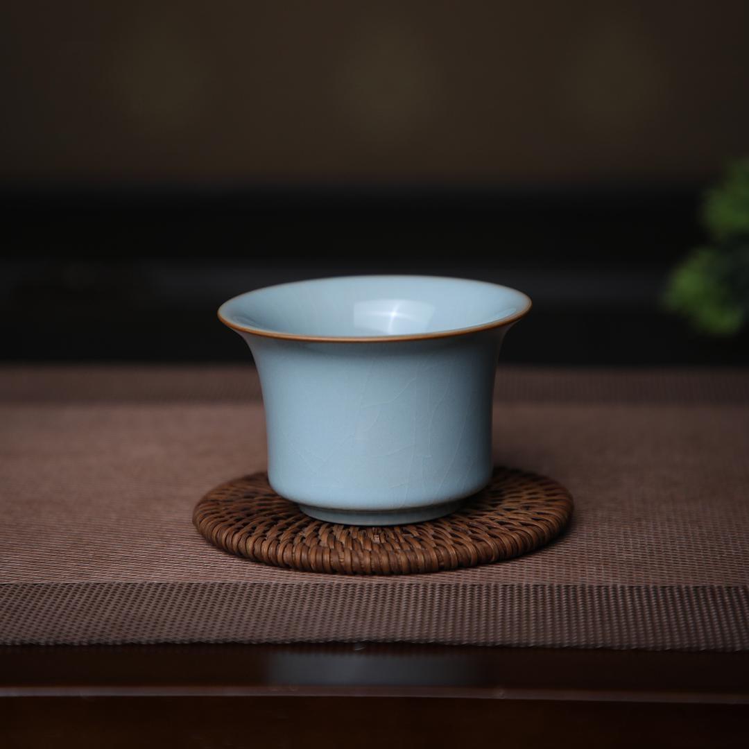 Zen tea ritual porcelain featuring Ru ware's serene glaze and intentional simplicity