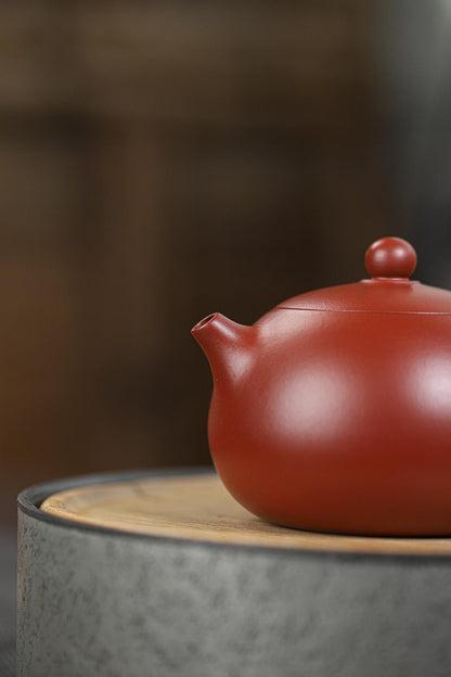 Fully handmade Yixing zisha Xishi teapot in authentic 'dahongpao' red clay, specially shaped for pu'erh and oolong tea brewing.